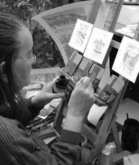 Photo - Norfolk Landscape Artist, Jan Dingle prepares her work